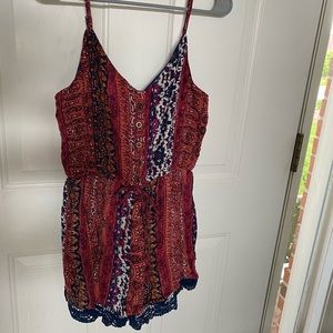 As U Wish multi-color romper w/ navy crotchet